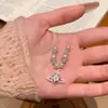 Collar de lujo ligero de cintura pequeña sin color de acero de titanio para mujer, accesorios de diseño de alta gama de nicho de celebridades de Internet de verano, colgante de cadena de clavícula