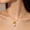 Collar de perlas barrocas vintage francés para mujer con cierre TO, cadena para la clavícula, diseño de nicho, joyería de alta gama, venta al por mayor transfronteriza