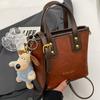 Bolso Cubo Versátil de Alta Gama Estilo Coreano, Nuevo Modelo Invierno 2026, Bolso de Hombro Único Cruzado, Bolso de Mano Vintage para Mujer
