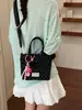 Bolso de mano de lunares con flecos estilo coreano para mujer, nuevo y versátil bolso de hombro, bolso cruzado y bolso para teléfono 2026