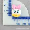 Pinza para el pelo de pelo de conejo Accesorios de resina Funda de teléfono Doraemon Pato Donald Adornos para el pelo DIY Oso pequeño Pollito Materiales hechos a mano Venta al por mayor