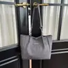 2026 Color Sólido Moda Nueva Tendencia Simple Popular Bolso Tote de Gran Capacidad para Mujer Textura Colgante Casual Bolso para el Trabajo