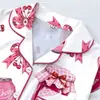 Conjunto de Pijama Cardigan Rosa de Seda Leite Transfronteiriço Europeu e Americano para Mulheres, Shorts de Manga Curta, Roupa de Casa Confortável e Respirável Conjunto Casual