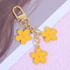 Pingente de chaveiro de flor colorido ins de fronteira criativo diy liga flor pequena dupla face decoração de bolsa para conjunto de fones de ouvido