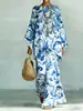 Nuevo conjunto de dos piezas para mujer: camiseta casual de moda con estampado transfronterizo, cuello redondo, manga larga + pantalones de campana