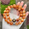 Agita las explosiones de sonido corazón material viejo pulsera de bodhi nube de fuego cuentas redondas doble círculo texto jugar cuentas de mano venta directa de fábrica