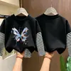 Camiseta de manga larga para niña, nuevo estilo primavera/otoño 2026, base infantil moderna y linda, conjunto de otoño de algodón puro, top tipo dos piezas