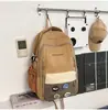 Nuevas mochilas para hombre y mujer para estudiantes de secundaria y preparatoria, gran capacidad, adecuadas para tutorías o como bolso de hombro, disponibles en dos estilos