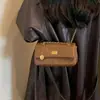 Bolso de hombro versátil, estilo coreano, diseño nuevo, simple y chic, colección 2026 para mujer, moda retro, correa de cadena, patrón de diamantes, estilo otoño