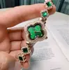Reloj de mujer de lujo ligero con incrustaciones de diamantes de imitación, reloj pulsera de moda, reloj de cuarzo con incrustaciones de diamantes en forma de trébol de cuatro hojas, venta al por mayor