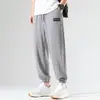 Calça Esportiva Stretch da Moda Jovem Popular com Amarração na Barra Masculina Tendência Primavera Casual Cor Sólida Calça de Nove Pontos Tipo Solto