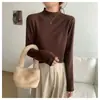 Camiseta base de estilo básico con cuello semi-alto y borde enrollado para mujer Primavera 2026 Otoño/Invierno nuevo estilo suéter temperamento tejido suave y liso