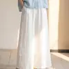 Pantalones de algodón y lino de pierna ancha, sencillos y artísticos, bordados para mujer, con cintura elástica, corte holgado y relajado, y longitud de tres cuartos fluida.