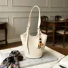 Bolsa Cesta de Vegetais Tecida Estilo Coreano Ins para Mulheres 2026 Outono/Inverno Nova Bolsa de Ombro de Alto Valor para o Dia a Dia Bolsa Saco