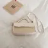 Bolso pequeño súper moderno y exquisito para mujer, nuevo 2026 ligero de lujo nicho de alta gama tejido bandolera