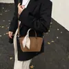 Moda Coreana Bolso Sencillo de Color Sólido Nuevo Estilo de Moda para Mujer Bolso Versátil de Hombro/Axila Bolso Tote Tipo Cubo