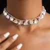 Conjunto de collar y pulsera de doble capa con forma de corazón incrustado de diamantes de estilo europeo y americano, sensación de lujo ligero y alta gama, cadena para la clavícula, accesorios de moda y versátiles al por mayor