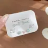 Pendientescombinados de lazo y flor con goteo de aceite dulces para mujer, frescos y coloridos, dulces y delicados, con un temperamento juvenil, pendientes de nicho