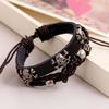 Pulseira de couro com contas de caveira personalidade europeia e americana pulseira punk atacado joias pequenas Yiwu pulseira trançada de couro de vaca
