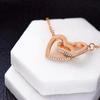 Europa transfronteriza y Estados Unidos Amazon explosiones moda oro rosa doble anillo color separación anillo entrelazado doble amor collar cadena clavícula