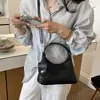 Bolsa de ombro tecida para通勤者 de moda transfronteiriça, bolsa de mão com design simples e nicho, bolsa transversal casual versátil para mulheres