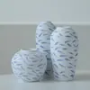 Jingdezhen Florero Cerámico Minimalista Moderno para Mueble de TV Flor Azul y Blanca Recipiente para Casa de Huéspedes Hotel Decoración con Flores Secas Envío Gratis