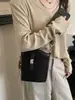 Bolso Cubo Retro de Bloques de Color de Moda con Cierre de Giro para Mujer 2025 Nueva Moda de Primavera Bolso de Hombro Cruzado Patchwork de Nicho