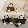 Bolsa Feminina Tecida Patchwork Fashion 2026 Verão Nova Moda Bolsa de Mão Única Ombro Bolsa de Balde Texturizada Tendência Transversal