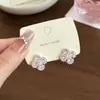 Pendientes Largos de Flor de Trébol de Cuatro Hojas con Microincrustaciones de Circonita Rosa, Pendientes de Circonita de Lujo Ligero y Gama Alta, Pendientes Estilo Princesa para Mujer