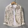 Camisa retro americana con estampado de tinta para hombre, colección otoño 2026, marca de alta gama a la moda, camisa con cuello elegante y corte holgado