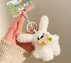 Muñeca Estrella Pequeña de Peluche Adorable con Sonido Colgante de Regalo Pequeño Llavero de Peluche Accesorio para Bolsos de Niña Venta al por Mayor