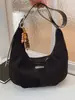 Bolsa Transfronteiriça de Camurça Feminina Grande Capacidade Nova Outono e Inverno 2025 Bolsa Transversal Fosca Retrô Bolsa Dumpling para o Trabalho