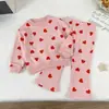 Conjunto Infantil Estilo Coreano para Bebês e Crianças Pequenas 2026 Outono Nova Coleção Estampa de Coração Menina Princesa Infantil Duas Peças Algodão