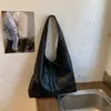 2026 Novo Estilo Simples Design de Nicho Fashionável Bolsa Tote Casual Retrô Grande Capacidade Bolsa de Ombro Bolsa de Axila Texturizada