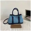2026 Nova Moda Bolsa de Mão Bolsa Saco para Mulheres Primavera Bonita Lona Bolsa Mãe-Filha Tendência Bolsa Transversal