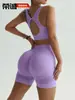 Nuevo conjunto de yoga transfronterizo: Shorts de fitness tipo durazno sin costuras que levantan los glúteos con almohadillas en el pecho, top deportivo y sujetador de yoga