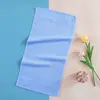 Toalla pequeña de color liso de celulosa de bambú al por mayor suave absorbente para lavado de cara de niños 27*52 bebé hogar toalla para niños
