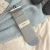 Meias doces com laço para mulheres, meias de cano médio para outono e inverno, meias empilhadas de renda retrô japonesas, meias femininas cinza e azuis