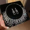 Aretes y Collar con Borlas de Flor de Pedrería Estilo Minimalista Conjunto de Joyería Exagerada Transfronterizo Europeo y Americano Accesorios de Lujo Ligero de Alta Gama