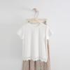 Camiseta informal de manga corta con cuello redondo y dobladillo calado para mujer, estilo verano 2025