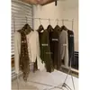 Cardigan Minimalista de Punto Trenzado con Cuello en V de un Solo Botón Color Verde Limón Té Otoño 2026 Estilo para el Trabajo (con bufanda)