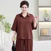 Conjunto de Duas Peças de Camisa e Calça Emagrecedoras Plus Size para Mulheres 2026 Novo Estilo Moda Verão para Mães de Meia-Idade e Idosas Terno de Lapela com Manga Curta