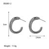 Pendientes de giro transfronterizos europeos y americanos Pendientes dorados en forma de C Personalidad de nicho Pendientes de moda simples Sentido de alta gama para mujeres
