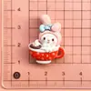 Caja de regalo de Navidad de dibujos animados Sanrio Diversión para niños material de paquete de accesorios de resina para funda de teléfono pasador diy hecho a mano pegamento de crema