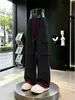 Pantalones de trabajo casuales con diseño multibolsillos en contraste negro y rojo para hombre, pantalones de pierna ancha rectos y holgados de tendencia street style con cordón