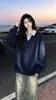 Sudadera de dos piezas de imitación con bloques de color para mujer, primavera y otoño, corte holgado, cuello camisero, top casual de algodón de manga larga estilo americano, moderno