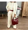 Estación Independiente Transfronteriza Europea y Americana 2025 Conjunto de 3 Piezas para Mujer: Top de Color Sólido con Cuello Redondo y Mangas Largas con Cinturón y Pantalones Cómodos