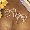Hebilla de zapato con flor pequeña de lana del mismo estilo de Corea del Sur, lazo de perla de ballet, flor de zapato, zapatos de entrenamiento alemanes, hebilla de cordón de amor decorativa