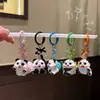 Encantador llavero de panda de resina 3D, animal de dibujos animados con lazo, dulce y adorable, perfecto como regalo para estudiantes o mejores amigos para colgar en sus mochilas