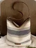 Bolso de hombro a rayas de algodón y lino vintage transfronterizo, bolso de mano de gran capacidad para viajes de vacaciones, bolso versátil de estilo étnico para debajo del brazo para mujer